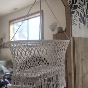 Macrame hanging bassinet